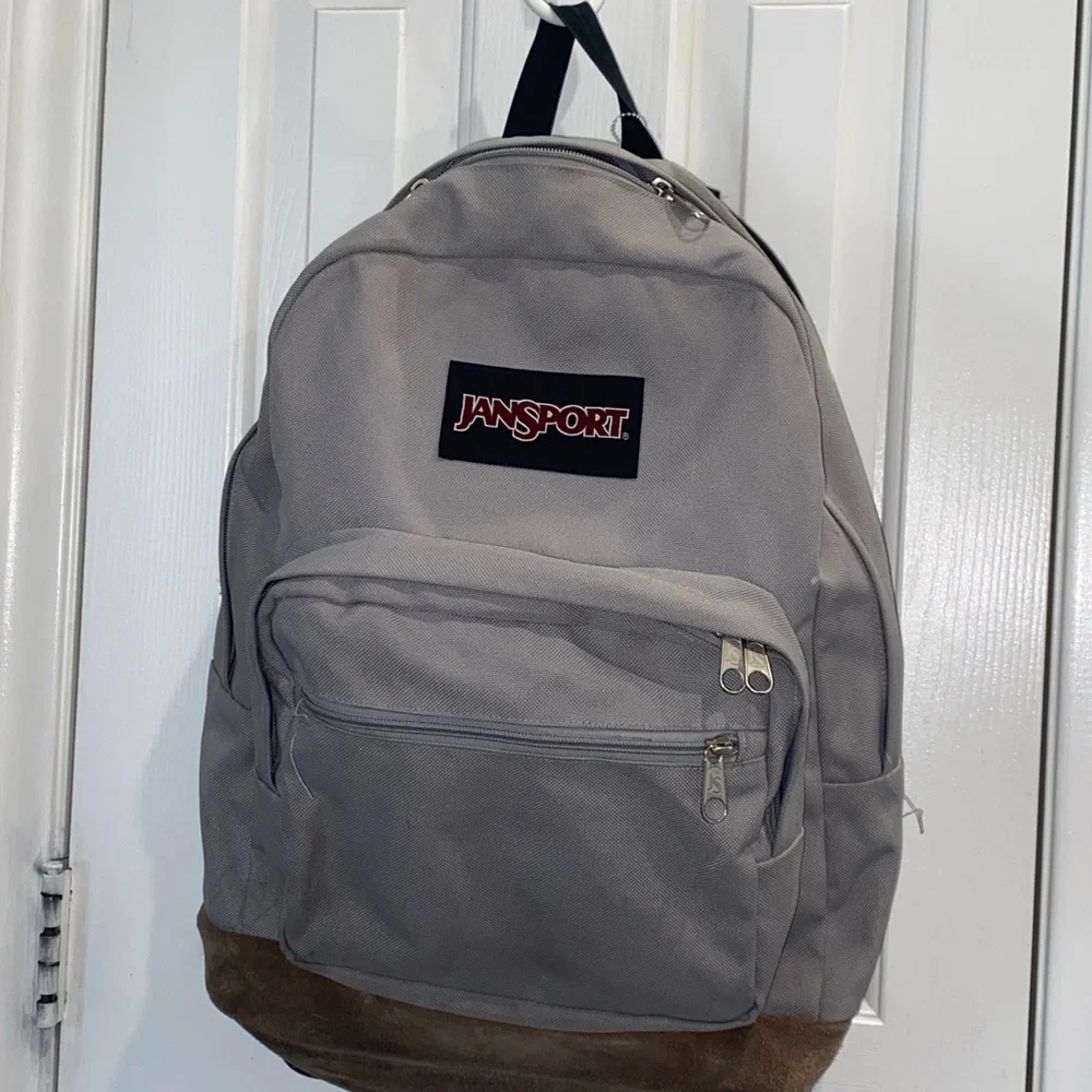 JanSport Gray Backpack with Brown Base